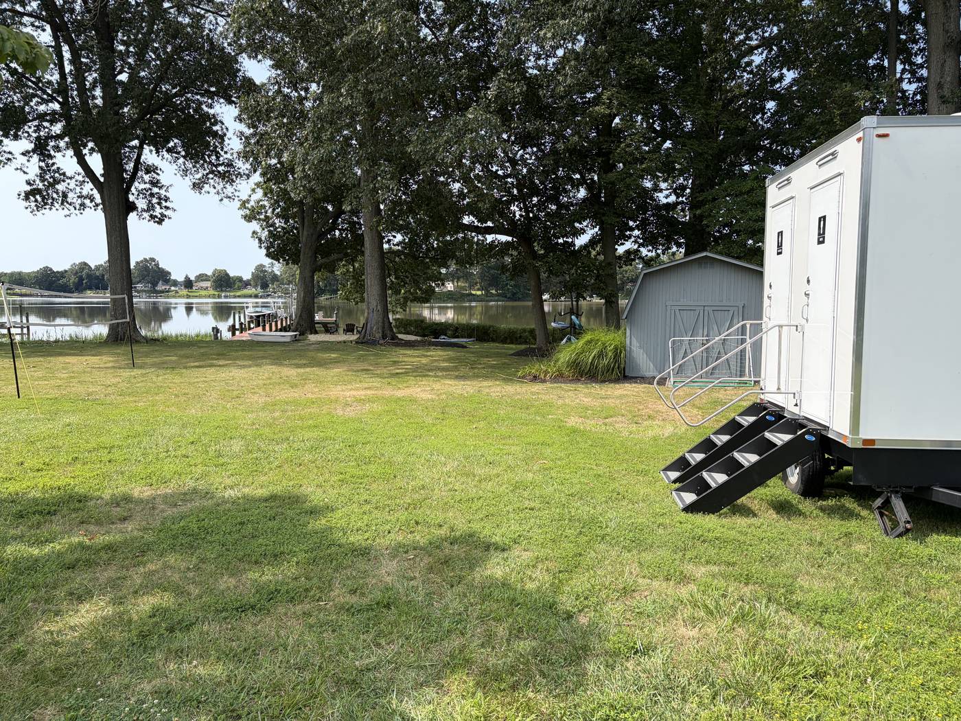 Luxury restroom trailer set up for a waterfront backyard wedding near St. Michaels, Maryland